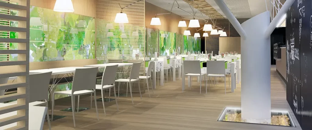 Contemporary restaurant with green-themed wall art and pendant lights